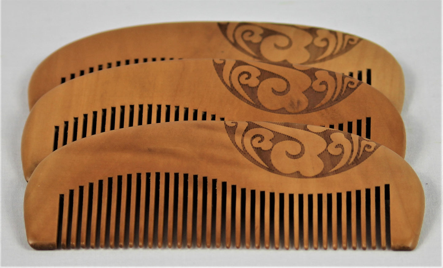 Stack of 3 sandalwood beard combs