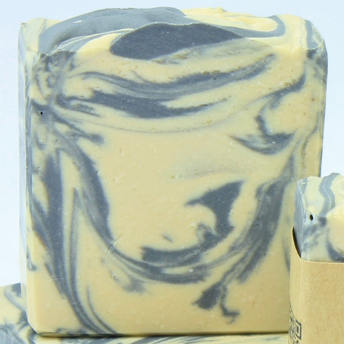 One 4oz bar of Hard Wood, unlabeled.  White bar with grey swirls.