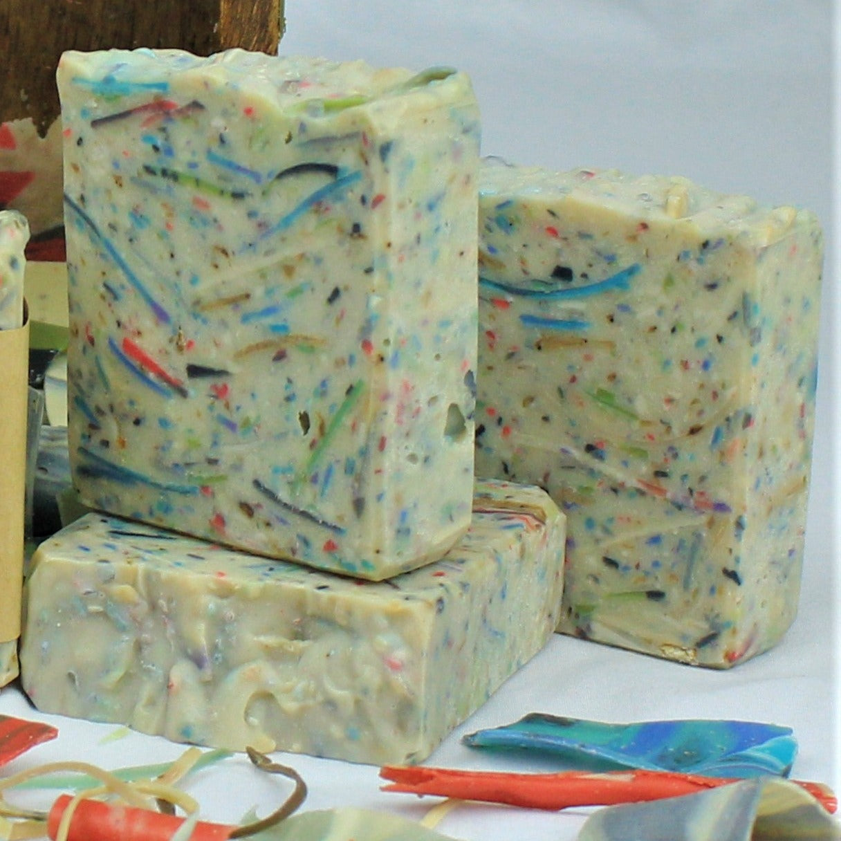 Three unlabeled cconfetti bars of Hot Mess soap, 4oz each.