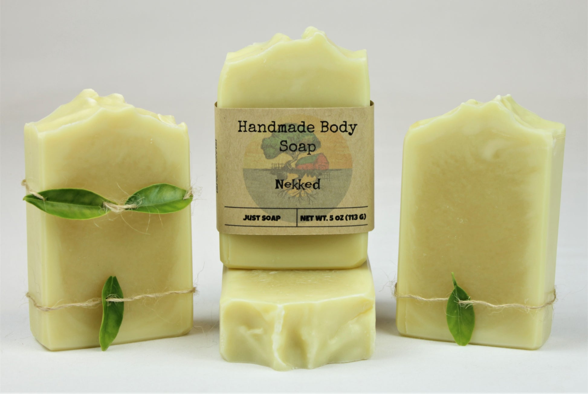 Four 5oz bars of Nekked handmade fragrance and colorant free soap.