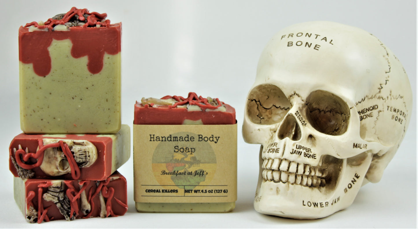 Four homemade 4.5oz bars of Breakfast at Jeff's. Displayed next to a skull with labeled bone sections.