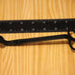 Candle wick trimmers, black, with a black ruler visible along the top and right edges for scale.