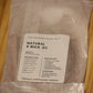 A clear plastic bag of The Wooden Wick Co. Natural X Wick .