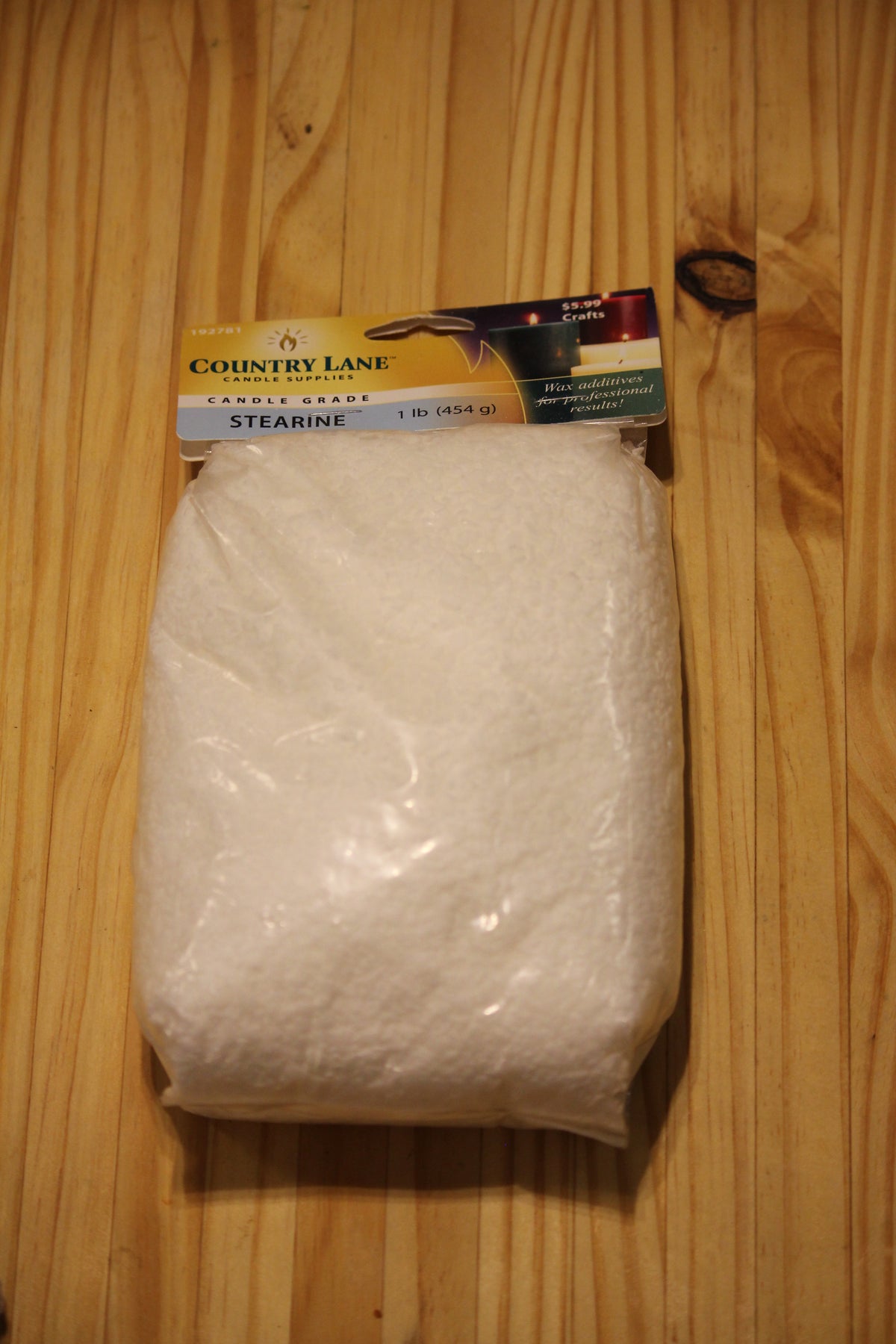 A packaged 1 lb (0.45 kg) of Country Lane Candle Co. stearine