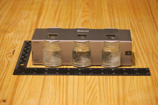 Set of 6 shot glasses, mason jar style, with Shots across the front. 