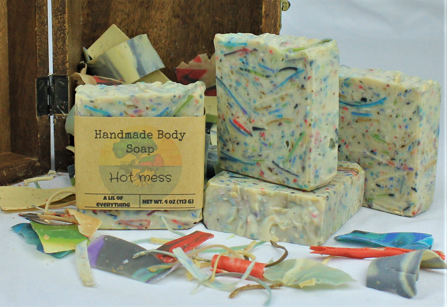 Hot Mess confetti soap, 4oz bars, shown with soap shavings. 