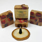 Four 4oz Incense soap bars, positioned around a burning incense cone. 